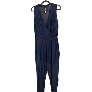 Blue jean jumpsuit. Designed for medium height. Worn once. Size medium regular